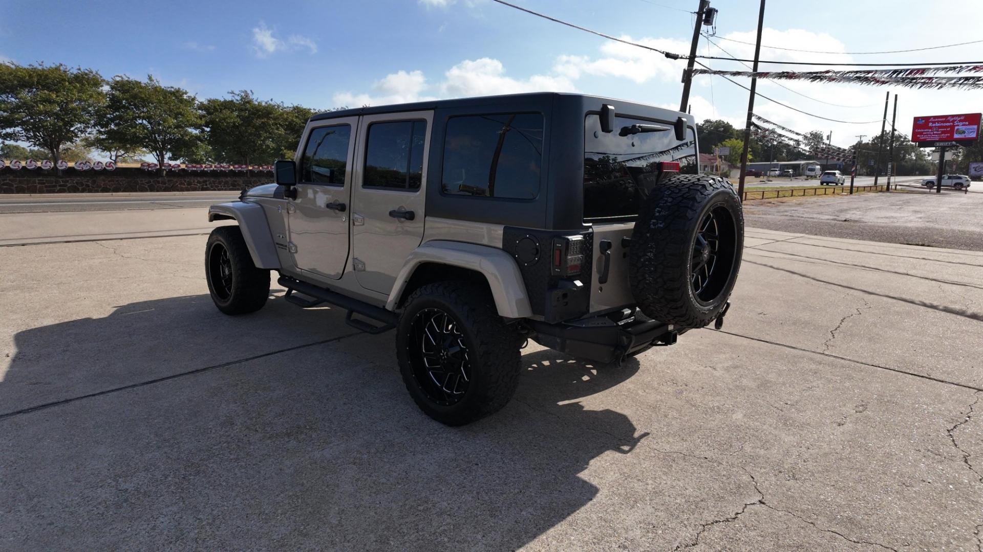 2016 /Black, cloth Black, leather Black/Dark Olive, leat Jeep Wrangler Unlimited Sahara 4WD (1C4BJWEGXGL) with an 3.6L V6 DOHC 24V FFV engine, 5-Speed Automatic6-Speed Manual transmission, located at 605 West Oak St., West, TX, 76691, (254) 826-5852, 31.803682, -97.097832- Photo#2